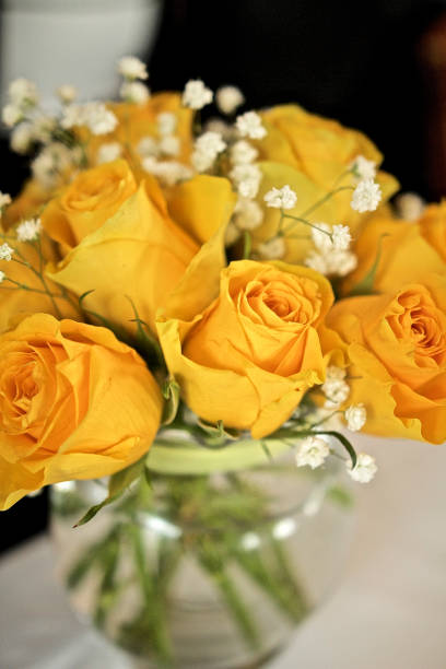 istock Bouquet of vibrant yellow roses 1144606473