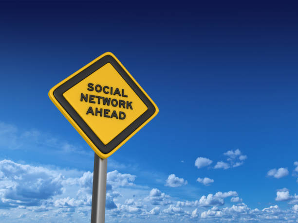 istock Social Network Ahead Road Sign - 3D Rendering 1144606548