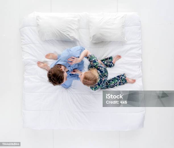 Happy Couple Tickling Each Other Stock Photo - Download Image Now - 20-24 Years, 20-29 Years, Above