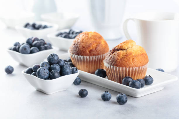 istock Muffins and blueberry on white table. 1144607371