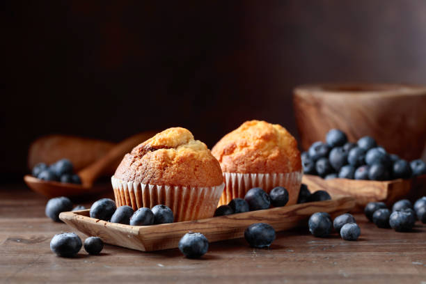istock Muffins and blueberry on a wooden table. 1144607907