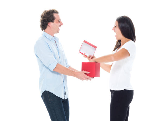 istock Husband giving a gift to his wife 1144607927