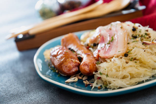 Central and Eastern European cuisines choucroute - sauerkraut with riesling Central and Eastern European cuisines choucroute - sauerkraut with riesling german food photos stock pictures, royalty-free photos & images