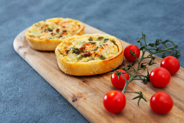 istock Seafood salmon and spinach tartlets 1144608187