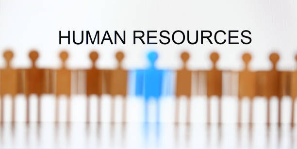 istock Human resources sign above line of toy human figures 1144611952