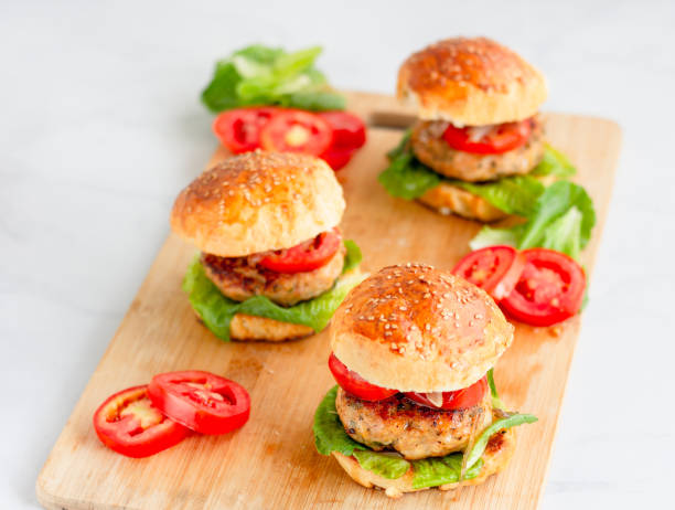 istock Hamburger on Wooden Base Horizontal Photo 1144611953
