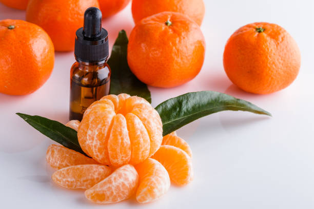 istock juicy mandarin on a white acrylic background 1144614065
