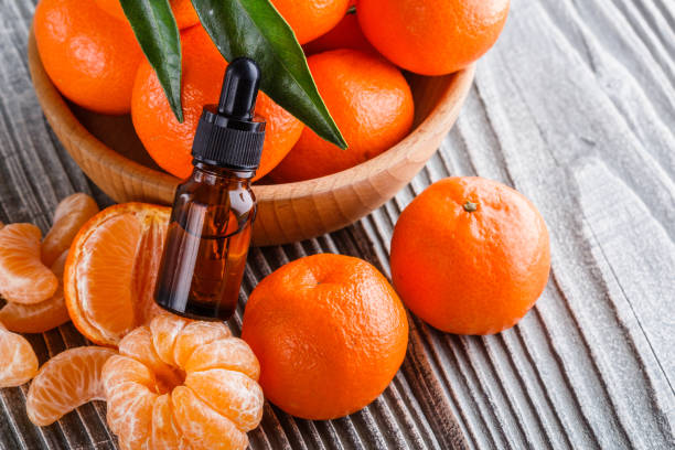 istock juicy mandarin on a gray wooden rustic background 1144616568