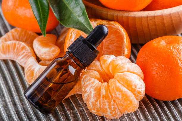 istock juicy mandarin on a gray wooden rustic background 1144616612