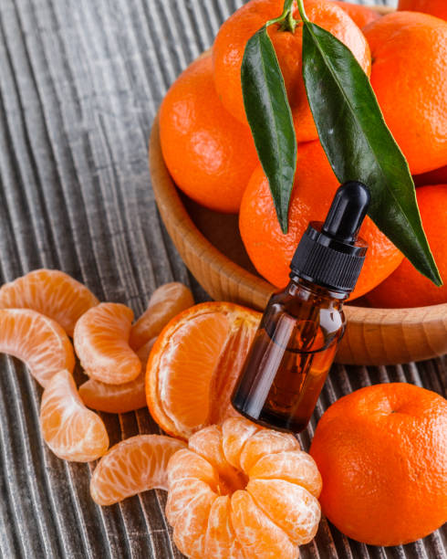 istock juicy mandarin on a gray wooden rustic background 1144616675