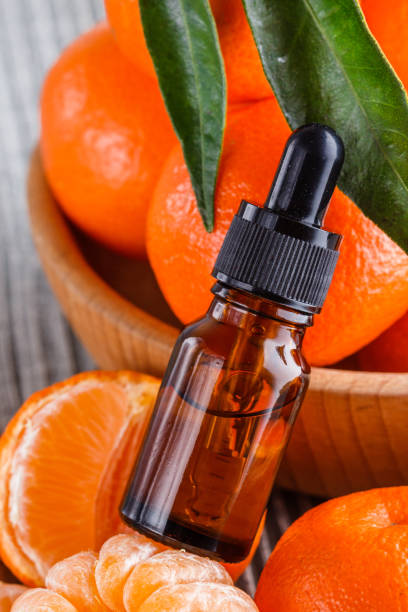 istock juicy mandarin on a gray wooden rustic background 1144616744