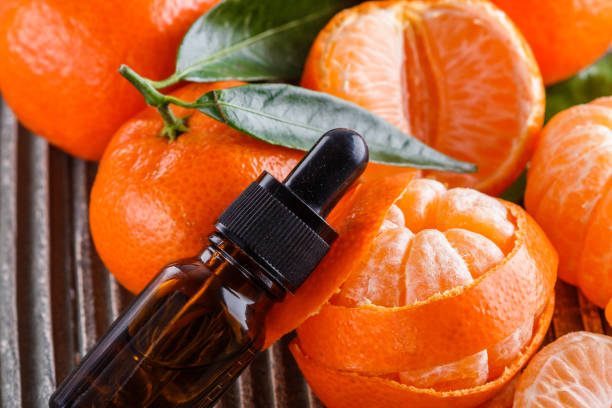 istock juicy mandarin on a gray wooden rustic background 1144617769