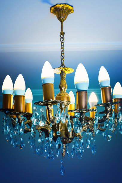 istock Crystal chandelier close-up. Gradient background 1144617777