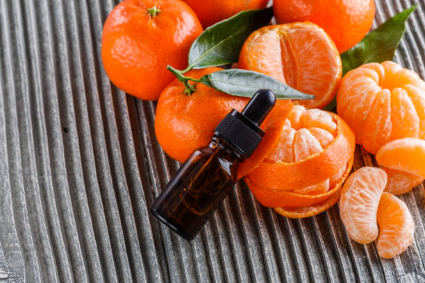 istock juicy mandarin on a gray wooden rustic background 1144617869