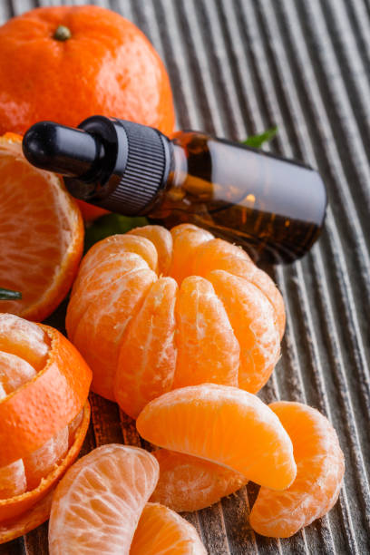 istock juicy mandarin on a gray wooden rustic background 1144617949