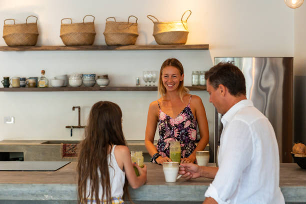 istock Family bonding inside of their home 1144619313