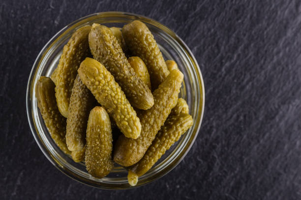 istock pickled vegetables on a dark stone background 1144619385
