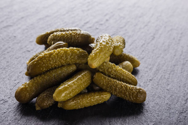 istock pickled vegetables on a dark stone background 1144620203