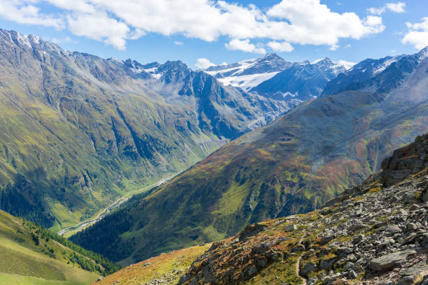istock Trekking in Alps summer vacation 1144621203
