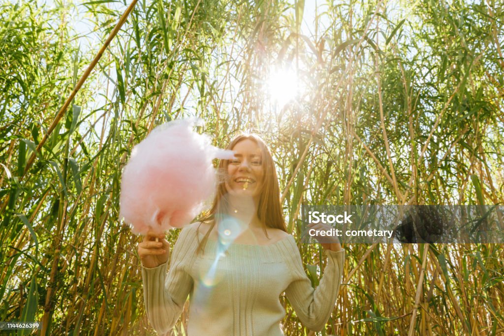 Beautiful People Holding Cotton Candy Cotton Candy Stock Photo
