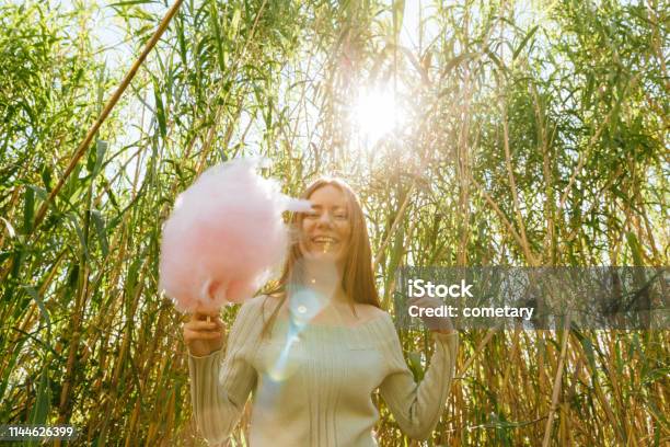 Beautiful People Holding Cotton Candy Stock Photo - Download Image Now - Cotton Candy, 25-29 Years, Adult