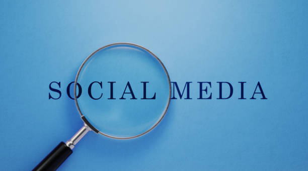 istock Magnifier And Social Media Text On Blue Background 1144627937