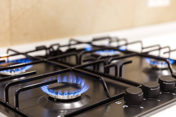 istock Gas burner on black modern kitchen stove 1144628285