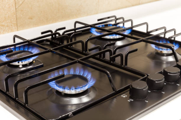 istock Gas burner on black modern kitchen stove 1144628328