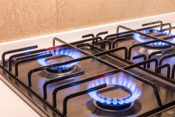 istock Gas burner on black modern kitchen stove 1144628429