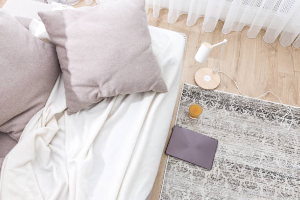 istock Comfortable sofa by the window at home. Freelance concept 1144628716