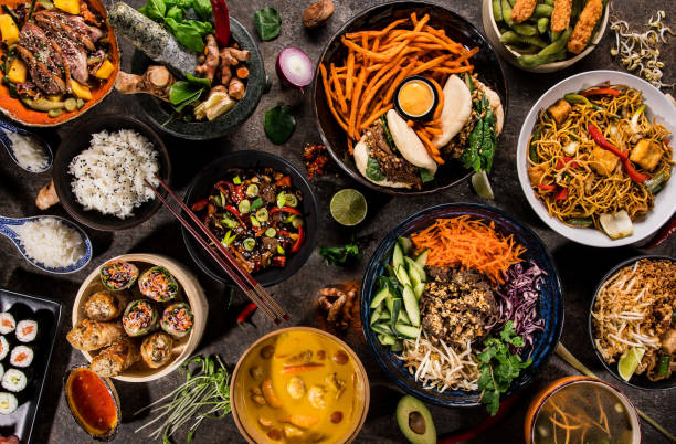 istock Asian food background with various ingredients on rustic stone background , top view. 1144630128
