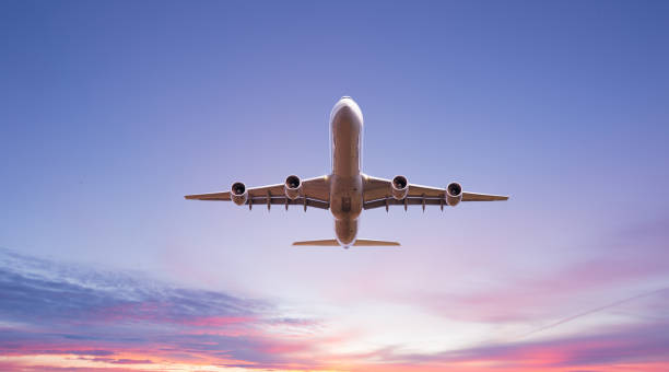 istock Commercial airplane jetliner flying above dramatic clouds. 1144630322
