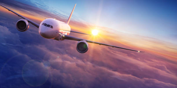 istock Commercial airplane jetliner flying above dramatic clouds. 1144630418