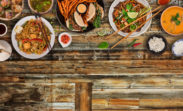 istock Asian food background with various ingredients on rustic wooden table , top view. 1144631250