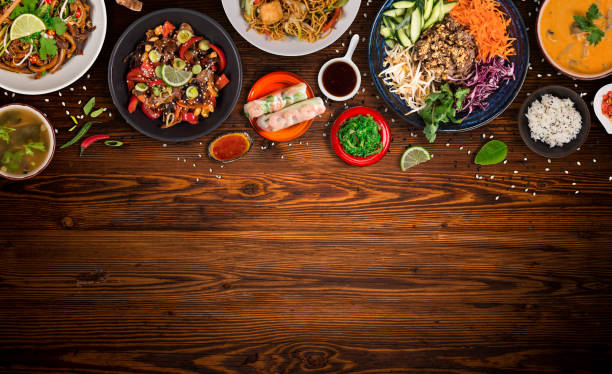 istock Asian food background with various ingredients on rustic wooden table , top view. 1144631272