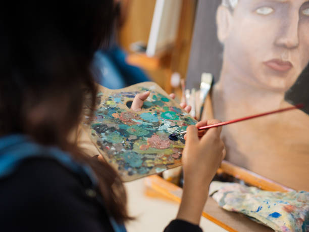 istock An art palette being used by a student painting 1144631610