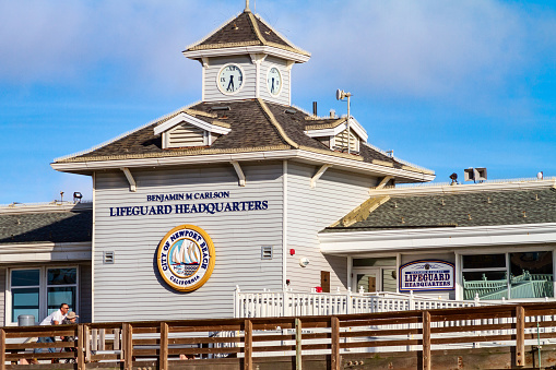 Newport Beach, CA / USA – April 6, 2019: Newport Beach Lifeguard Headquarters located on the pier in Newport Beach, California.