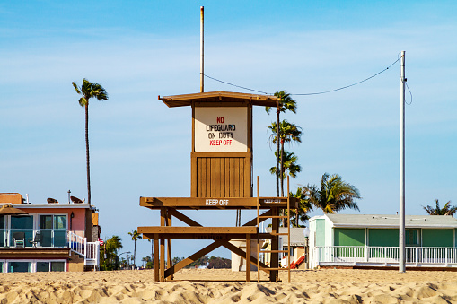 Newport Beach, CA / USA – April 6, 2019: Lifeguard Tower on the beach in Newport Beach, California in the Balboa Peninsula area.