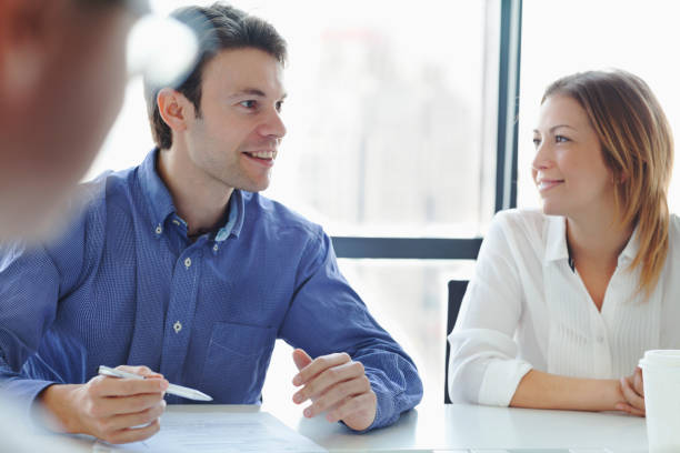 istock Colleagues talking in meeting together 1144634887