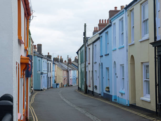 istock Narrow road through a traditional fishing community in Devon UK 1144636624