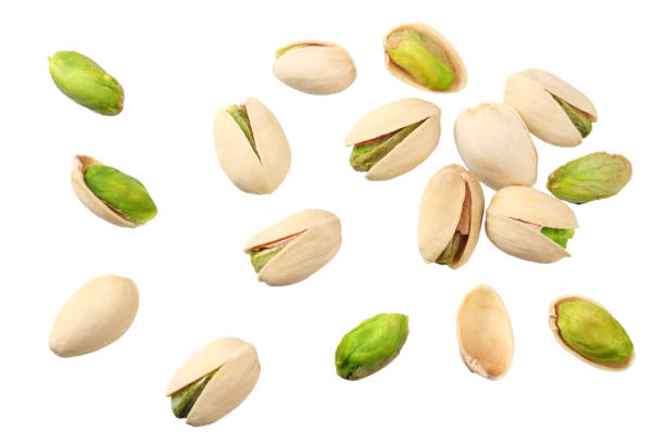 istock pistachio isolated on the white background. top view 1144637718