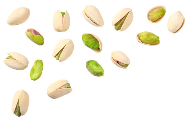 istock pistachio isolated on the white background. top view 1144637732