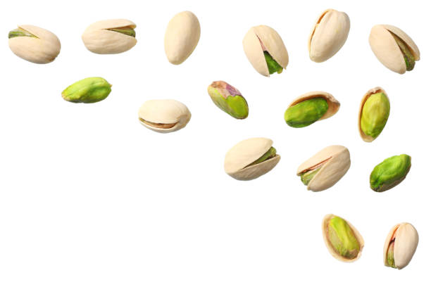 istock pistachio isolated on the white background. top view 1144637761
