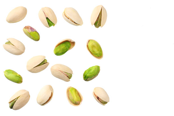 istock pistachio isolated on the white background. top view 1144637793