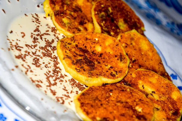 istock Cheesecakes with sour cream and chocolate chips on plate. 1144638178