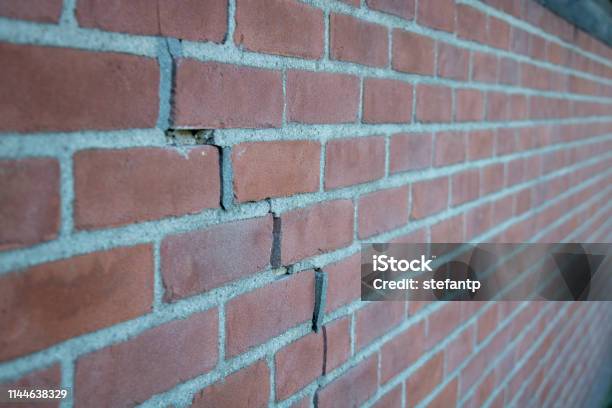 Crack In Brick Wall Caused By Subsidence Stock Photo - Download Image Now - Groningen City, Groningen Province, Earthquake