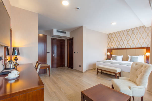 istock Interior of a modern new double bed hotel bedroom 1144643687