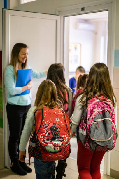 Schoolchildren walking to the classroom