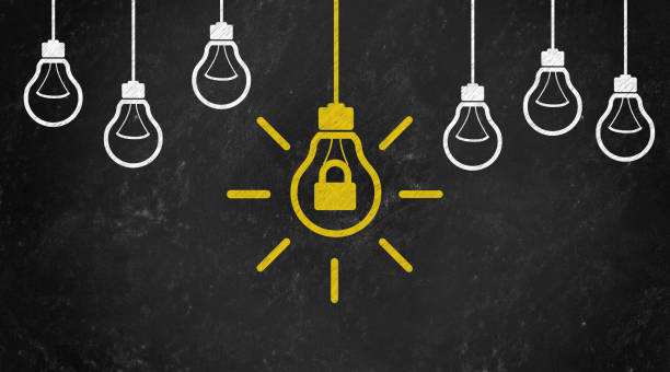 istock lock Symbol with Bulb Concept Chalk Drawing on Blackboard 1144645797
