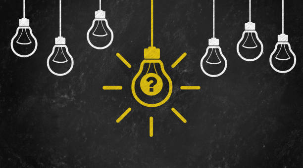 istock question mark Symbol with Bulb Concept Chalk Drawing on Blackboard 1144645890
